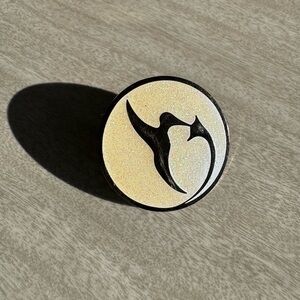 Round Glittery Pin with Black Bird Design